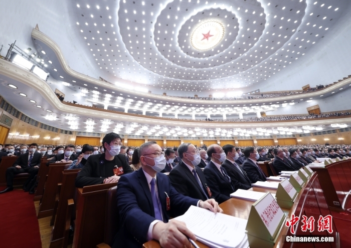 3月7日，十四屆全國人大一次會議在北京人民大會堂舉行第二次全體會議。<a target='_blank' href='/'>中新社</a>記者 盛佳鵬 攝