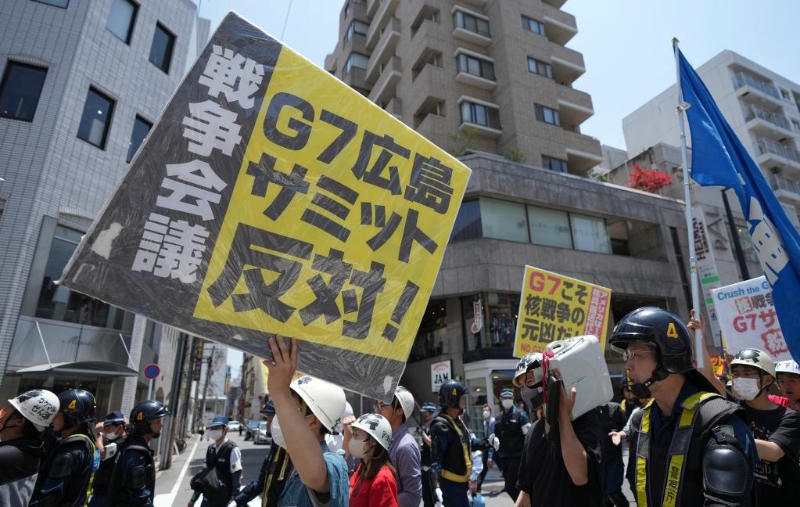 5月21日，民眾在日本廣島游行抗議七國集團峰會。新華社記者張笑宇攝